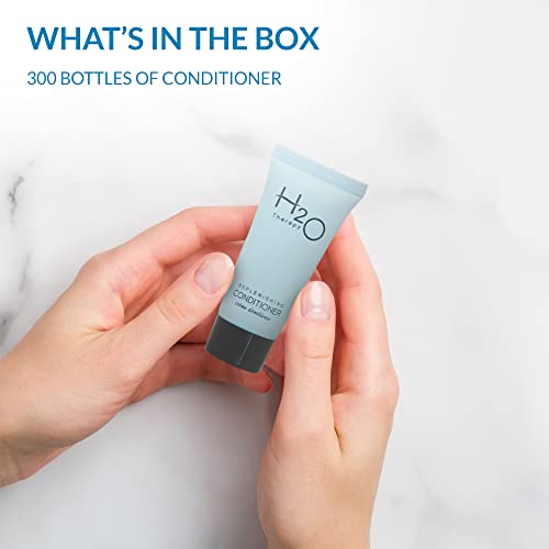 Travel Size Hotel Conditioner 200 Count 1 oz Bottles Guest Amenities for Hotels Vacation Rentals and Short Term Rentals Paraben Free White Tea and Coconut Scent Infused with Aloe & Olive Oil by INFUSE