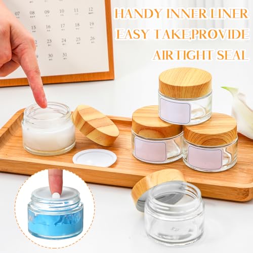 Layhit 24 Pcs 50 ml Cosmetic Glass Jars with Lids 1.69 oz Small Jars with Plastic Woodgrain Lids, White Labels and Inner Liners Empty Round Cosmetic Containers for Creams Lotions Powder Candle Making