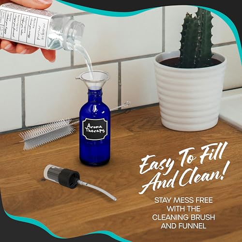 Nevlers 1 Oz Blue Glass Spray Bottles for Cleaning, Refreshment & More | Small Spray Bottle Travel Size 24 Pack w/Shrink Wrap, Funnel, Brush, Marker & Labels | Perfume Travel Refillable Containers