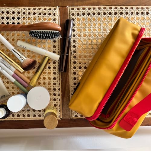 Cincha Toiletry Bag for Travel ? Spill-Resistant Dopp Kit with Multiple Compartments, Opens Flat for Easy Access ? Durable, Stylish Organizer for Men & Women (Marigold)