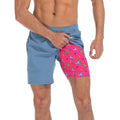 Men's 7-Inch Inseam Athletic Shorts with Compression Liner - Blue/Pink Surfer Dino, Size S